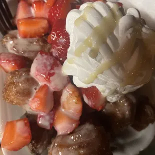 Churros bites with fresh strawberries and homemade whip cream