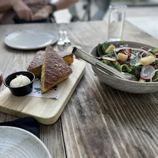 a plate of food on a wooden table