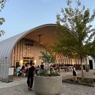 people sitting outside a restaurant