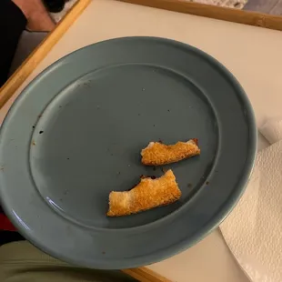 two pieces of bread on a plate