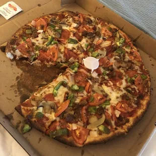 a whole pizza in a box