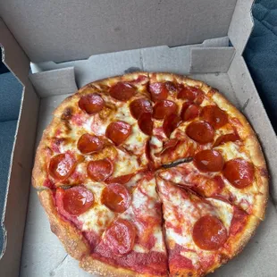 Small pepperoni pizza.