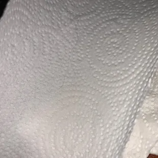 a close up of a piece of pizza