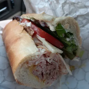 The Congin (only half pictured) - turkey, ham, roast beef, cheese, lettuce, tomato, mustard and Miracle Whip