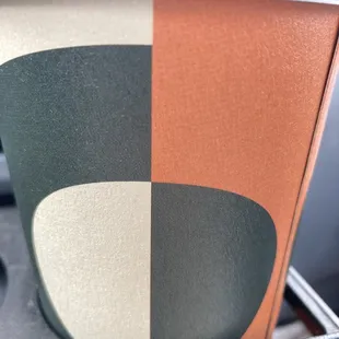 their version of a large cup of coffee (note their motif/design)