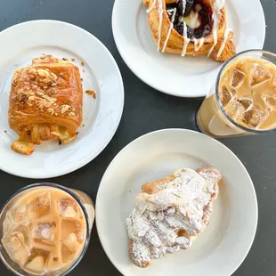 almond croissant, blackberry danish, bacon gouda pastry, and iced lattes