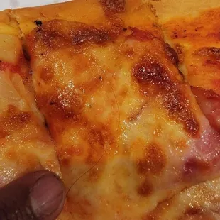 Pizza with hair topping