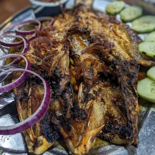 a platter of grilled fish
