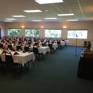 Banquet room set for a business dinner.