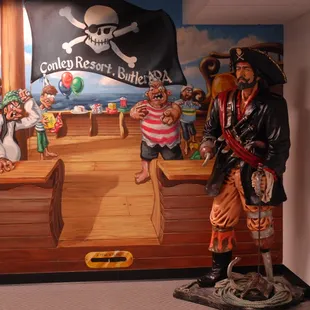 Hand-painted murals adorn the walls in the Pirate's Cove party room area.