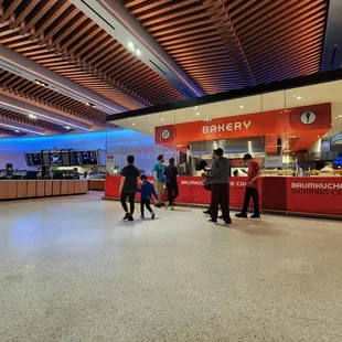 people standing in line at the counter