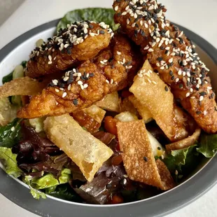 General Tso Chicken Salad - Kale, Broccoli Slaw, Red Pepper, Mandarin Oranges, Edamame, Wontons, Fried Chicken, General Tso's Dressing