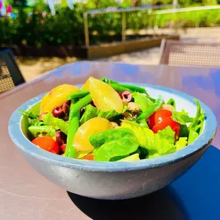 Vegan Nicoise-Style Salad: Mixed Greens, Romaine, Wedged Potatoes, Tomatoes, Green Beans, Olives, White Beans, Dijon Vinaigrette