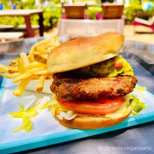 Vegan Black Bean Burger, Lettuce, Tomato, Guac, Chipotle Sauce, Toasted Brioche Bun