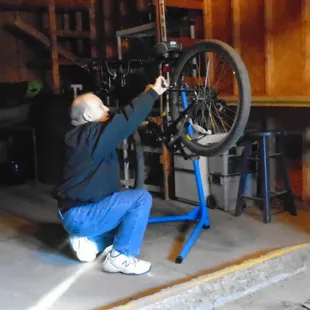 Work area for bicycles in the locked, bicycle storage garage