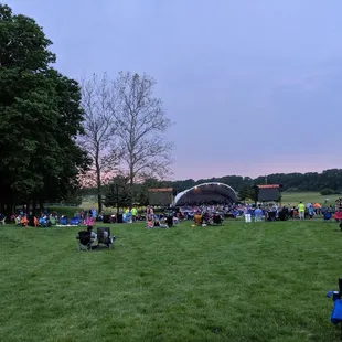 The SotP stage and lawns at dusk.