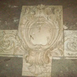 One of three large 5 piece terra cotta exterior cartouche pieces from a 1917 church.