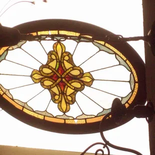 Oval stained glass window