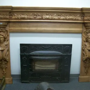 Elegant hand carved maple fireplace mantle