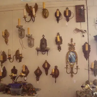 Numerous single and paired sconces