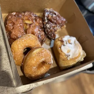 Apple fritters, glazed raised, and cinnamon roll