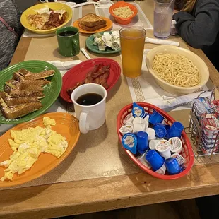 a table full of breakfast foods