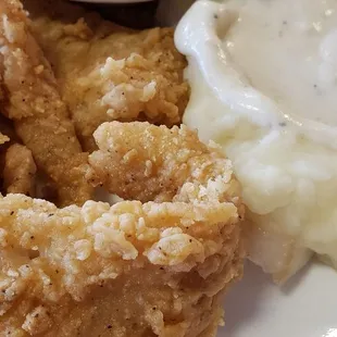 Fried white fish, fresh mashed potatoes and green beans