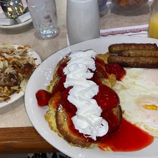 Cinnamon French Toast with strawberries&amp; whip cream, hash browns, turkey sausages, over easy eggs and the best orange juice I ever tasted.