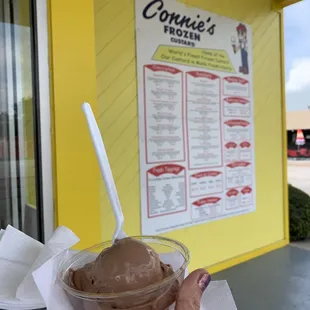 Scoop of chocolate custard in cup