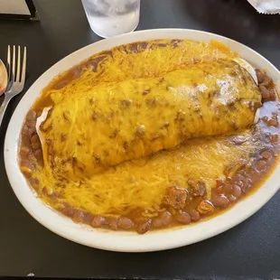 Pork and chili burrito with chili and extra cheese