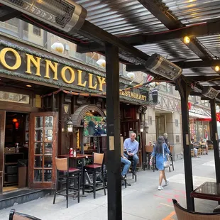 Front view with patio dining.