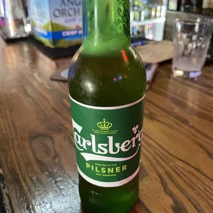 a bottle of beer on a table
