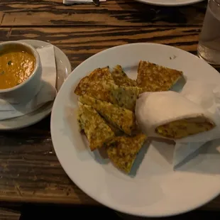 Game day breaky. Bacon egg and cheese burrito w potato pancakes. Added side of curry sauce.