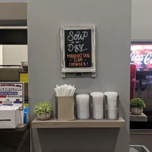 a sign on the wall of a restaurant