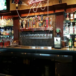 a bar with a neon sign