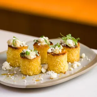 Cornbread Muffins:
Habanero-cotija butter
Texas honey drizzle