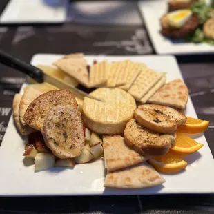 Fried Brie with pita, crackers, bread, seasonal fruit, and honey $15.00