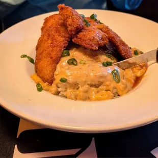 Maple Buffalo Chicken strips over Biscuits and spicy Gravy