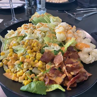 This salad was the house cob with fried lobster!  Delicious and enjoyed with a glass of sparkling wine!