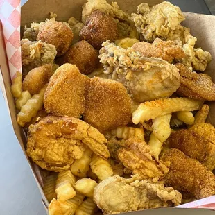 The big daddy. Fish shrimp chicken oysters fries hush puppies