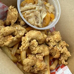 Chicken nuggets, fries &amp; peach cobbler.