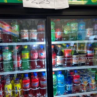 a display of sodas and soft drinks