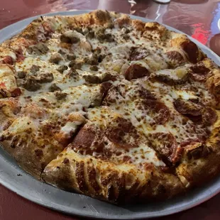 Half n half cheese and sausage pizza