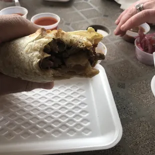 Carne Asada burrito. Sorry I had to take a bite.