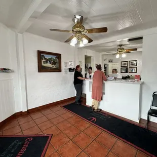 a woman standing at the counter