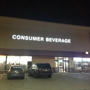cars parked in front of a store