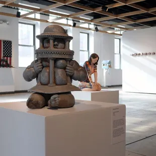 Gallery view of Contemporary Craft&apos;s exhibition - Visual Voices. Front work: Dennis Gerwin. David and Goliath, 2016.