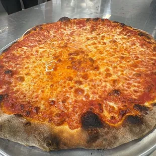 Hot and delicious cheese pizza fresh out of the oven!