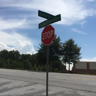 a stop sign and street signs