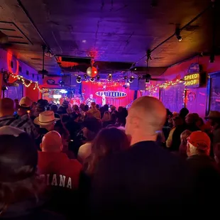 a crowd of people in a club